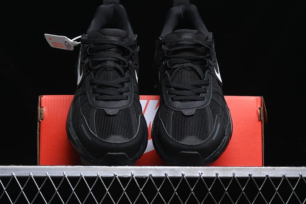 Front view of the pair showing the mesh toe and lace-up closure