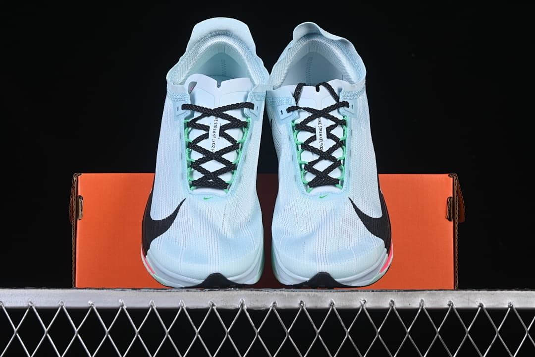 Front view of the pair resting on an orange shoe box