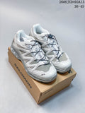 Pair of white and grey Salomon-style low-top sneakers with quick laces on a branded box; image overlay shows sizes 36–45.