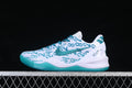 Side view of white and teal Nike Kobe 8 basketball shoes with number-patterned upper