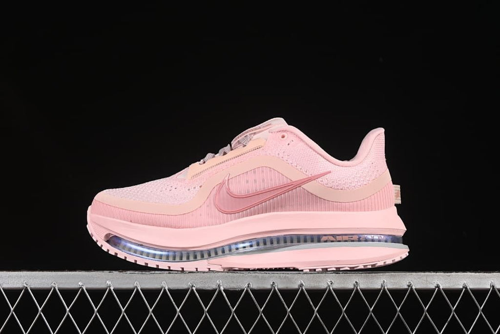 Side view of a pink Nike Air Zoom Pegasus Premium running shoe