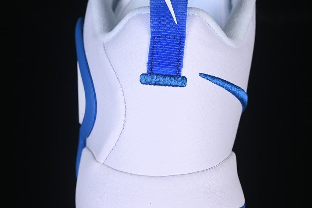 Close-up of the shoe's heel and blue pull tab
