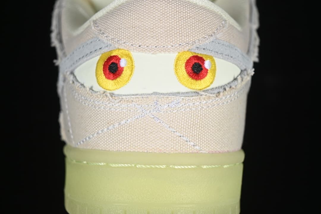 Rear view with embroidered eye graphics and translucent outsole