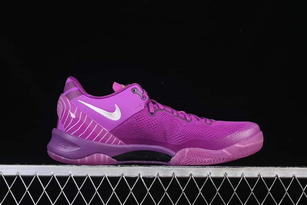 Side profile highlighting the purple upper, white Swoosh, and sole