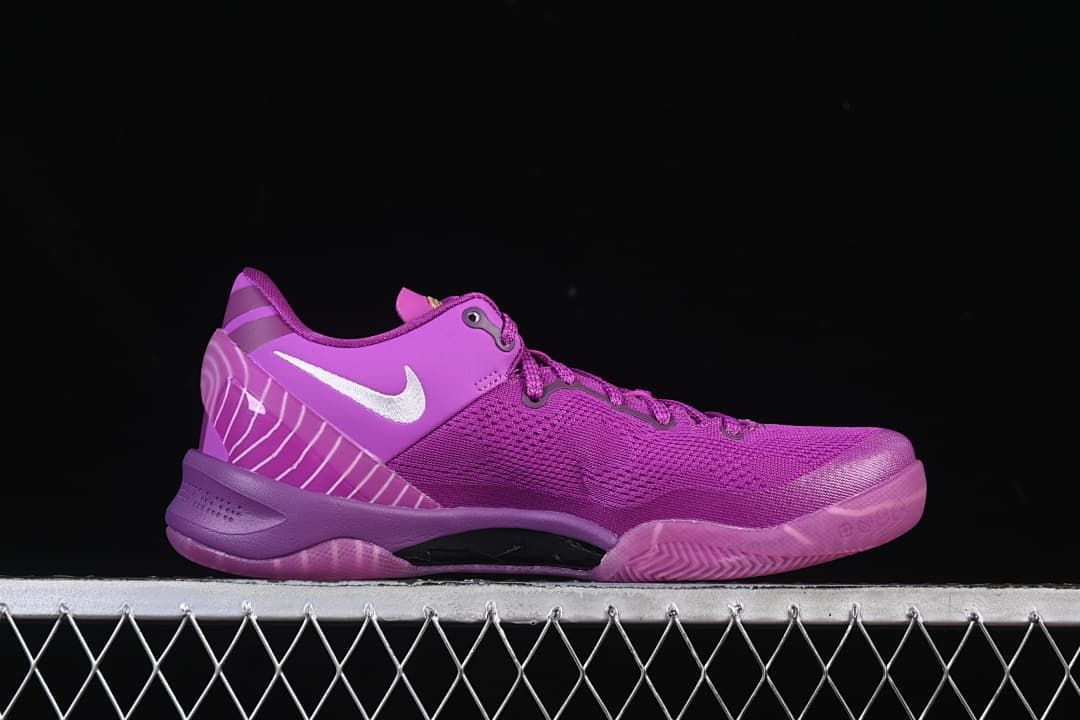 Side profile highlighting the purple upper, white Swoosh, and sole