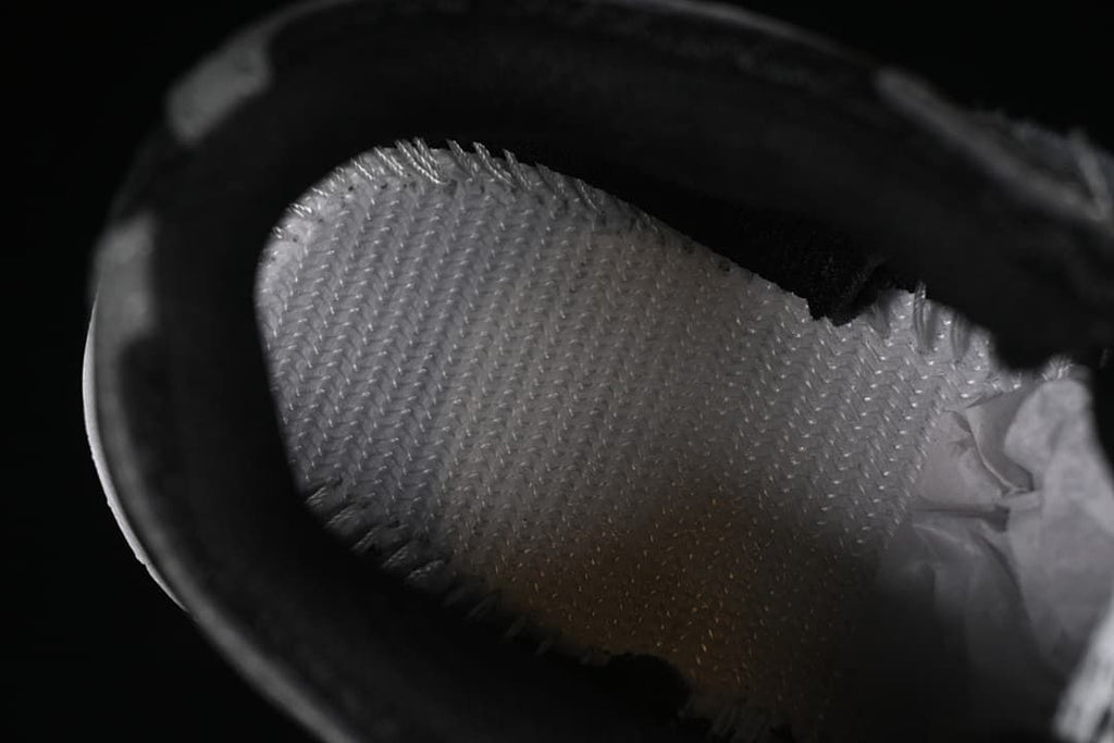 Close-up view inside the sneaker, showing textured interior material.