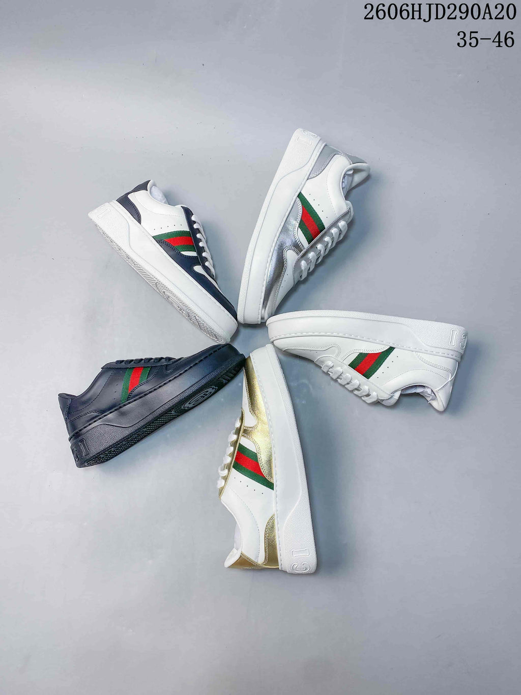 Several low-top sneakers arranged together, showing multiple color variations