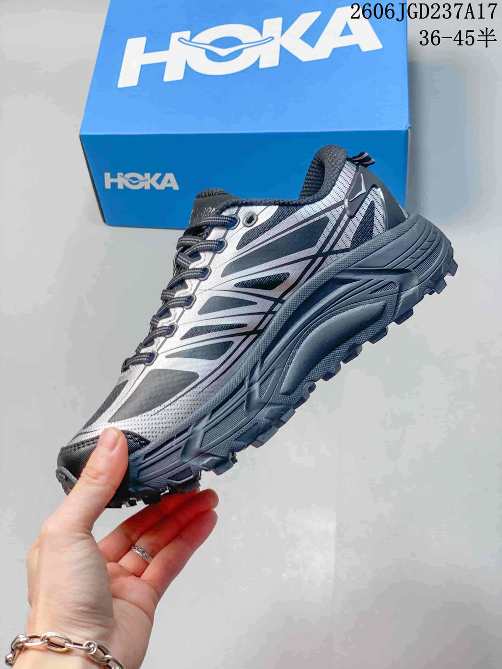 Side view of a silver-grey HOKA U Mafate Speed 2 trail shoe