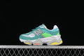 Side view of teal, white, lime, and gray New Balance 9060 kids sneakers