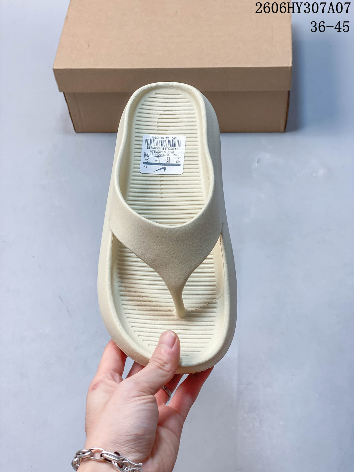 Top view of the sandal showing its ridged footbed and thong strap