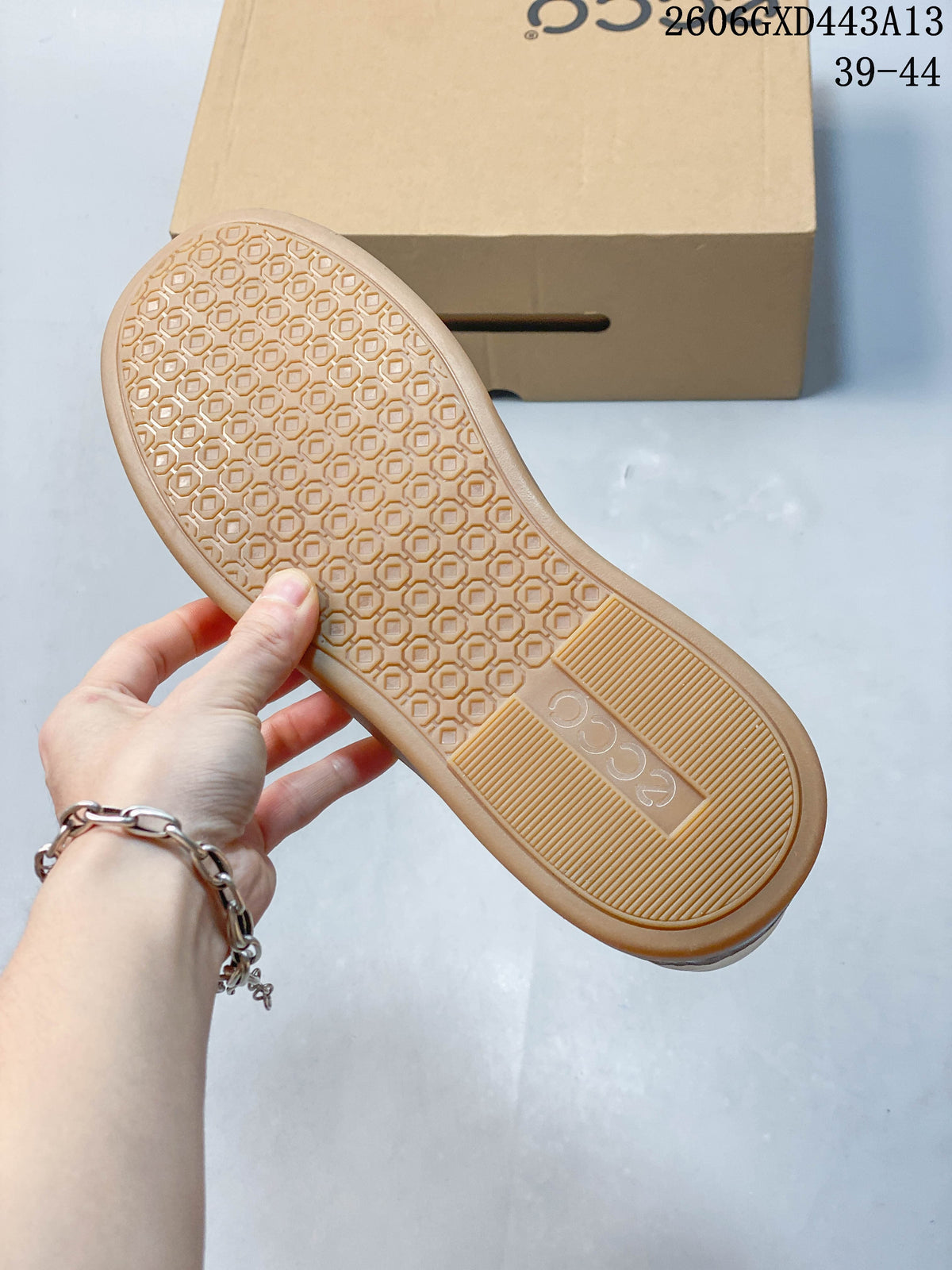 Close-up of the gum-colored outsole with a geometric tread pattern