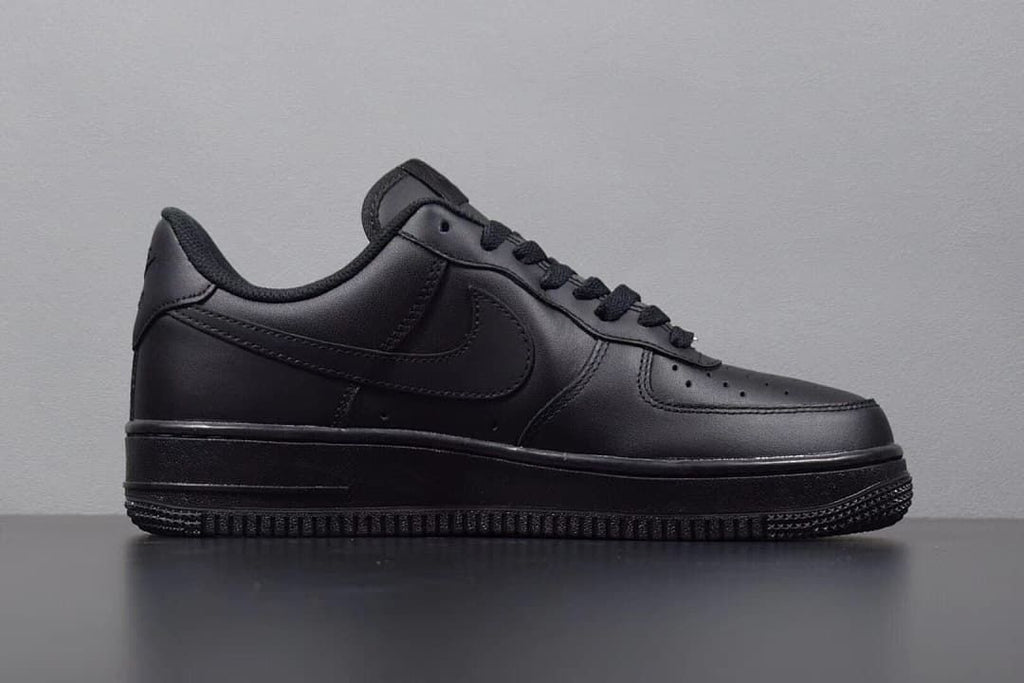 Side profile of the black low-top sneaker