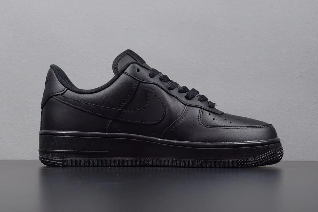 Side profile of the black low-top sneaker