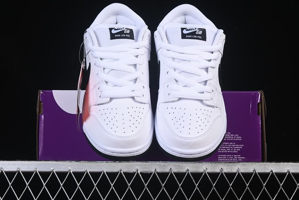 Front view of the pair showing perforated toe panels and white laces