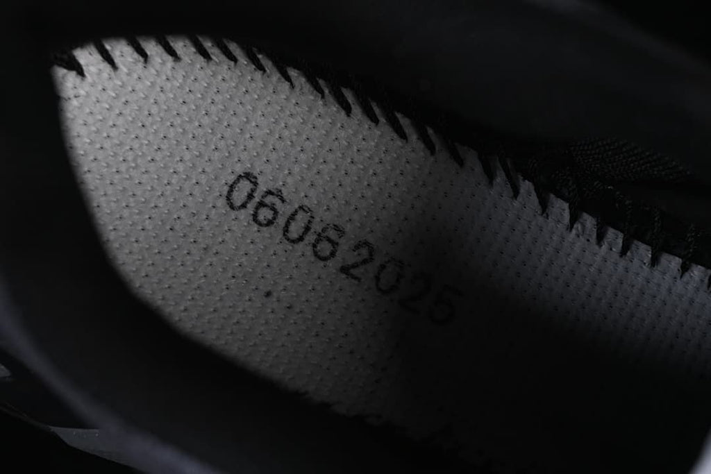 Close-up of a shoe interior and printed marking