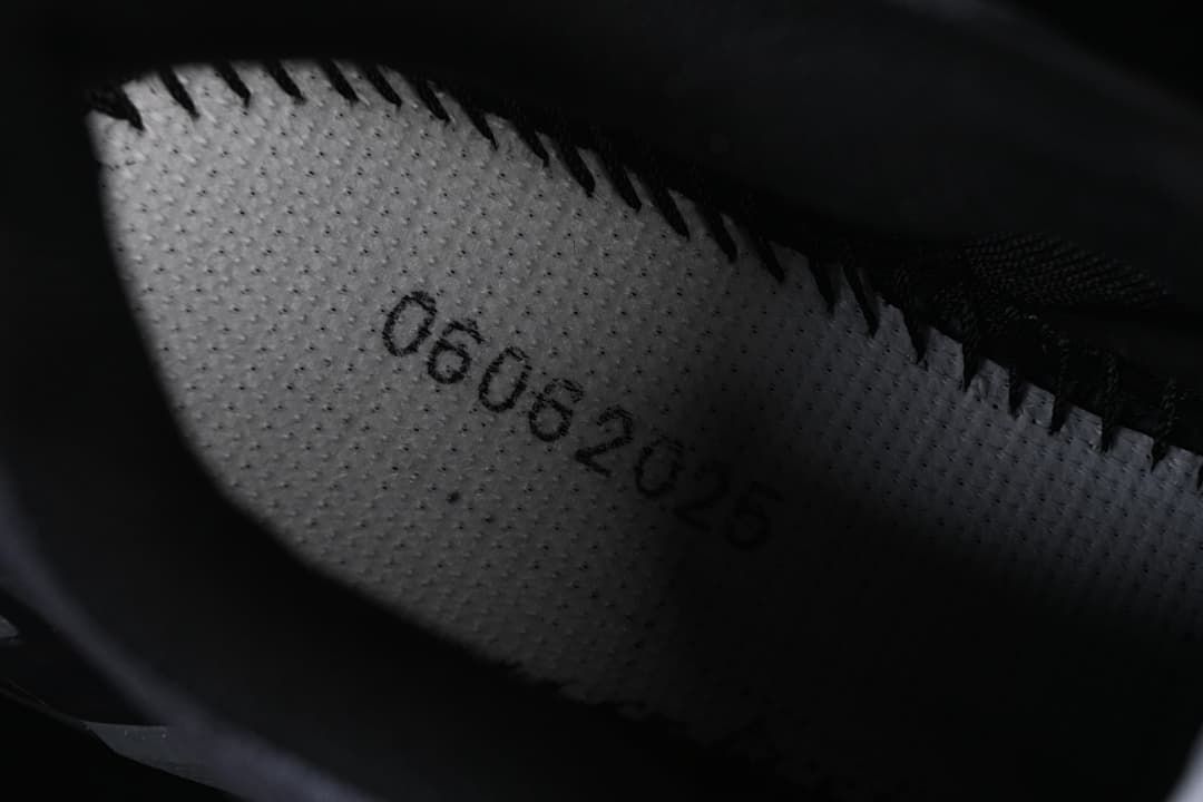 Close-up of a shoe interior and printed marking