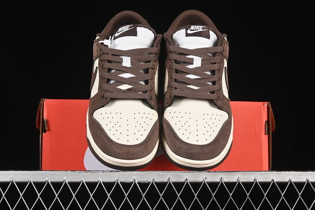 Front view of the pair showing perforated toes and brown laces
