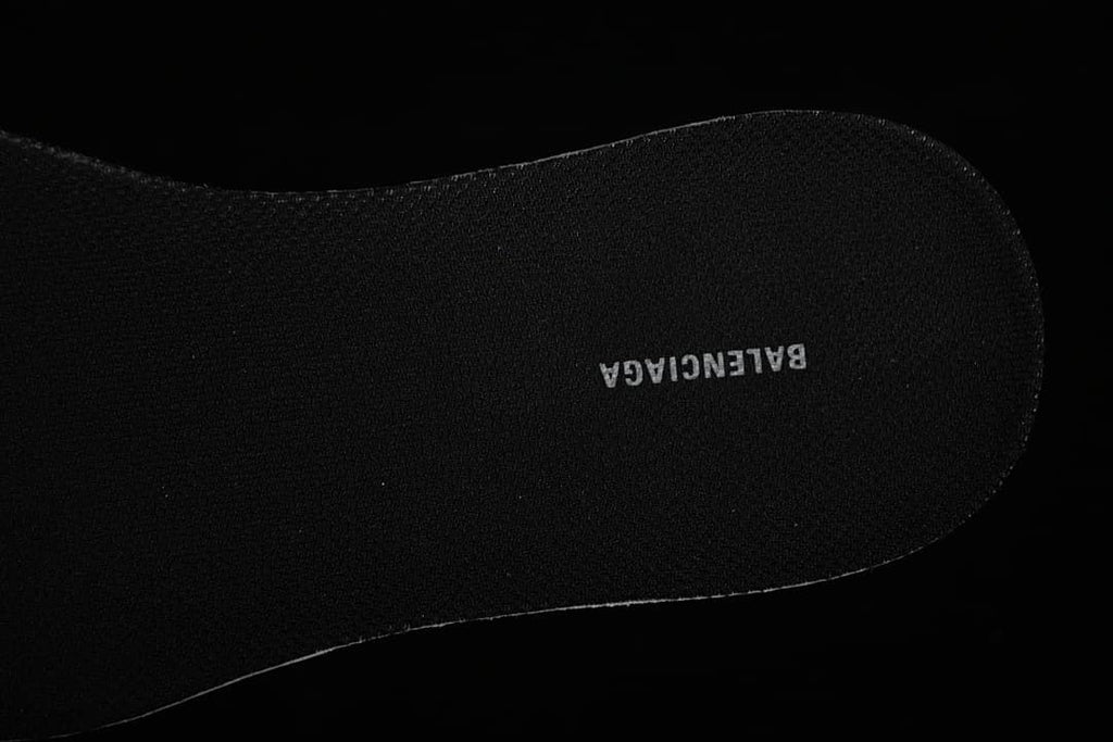 Black insole with Balenciaga branding.