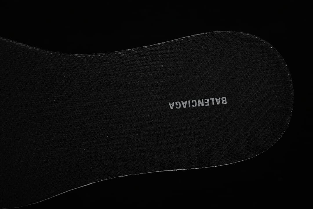 Black insole with Balenciaga branding.