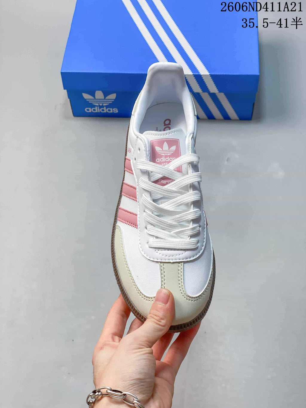 Top view of the sneaker showing white laces and pale toe panels