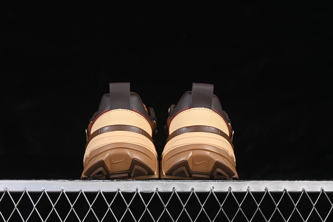Rear view of the pair showing heel panels and outsoles