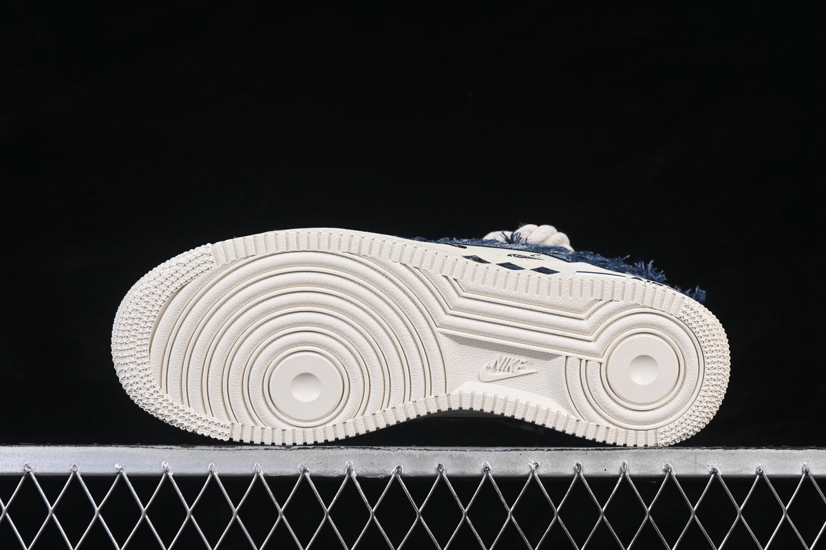 Underside view of the off-white outsole with circular traction pattern