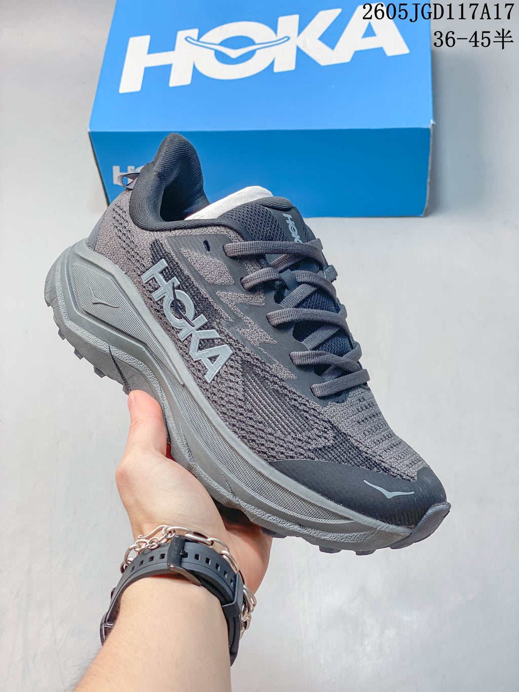 Gray Hoka Mafate Speed 2 shoe with a matching gray outsole and pale accents.