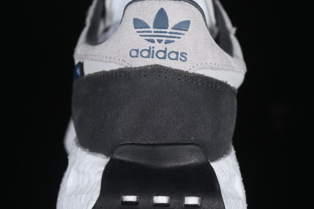 Rear view showing adidas Trefoil branding and charcoal heel panel