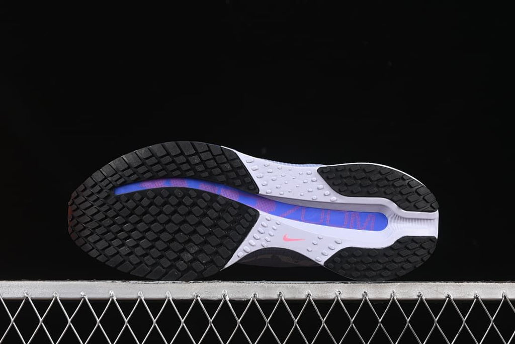 Underside view showing the black outsole tread