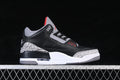 Side profile of a black Air Jordan 3 with grey cement-pattern overlays and red accents