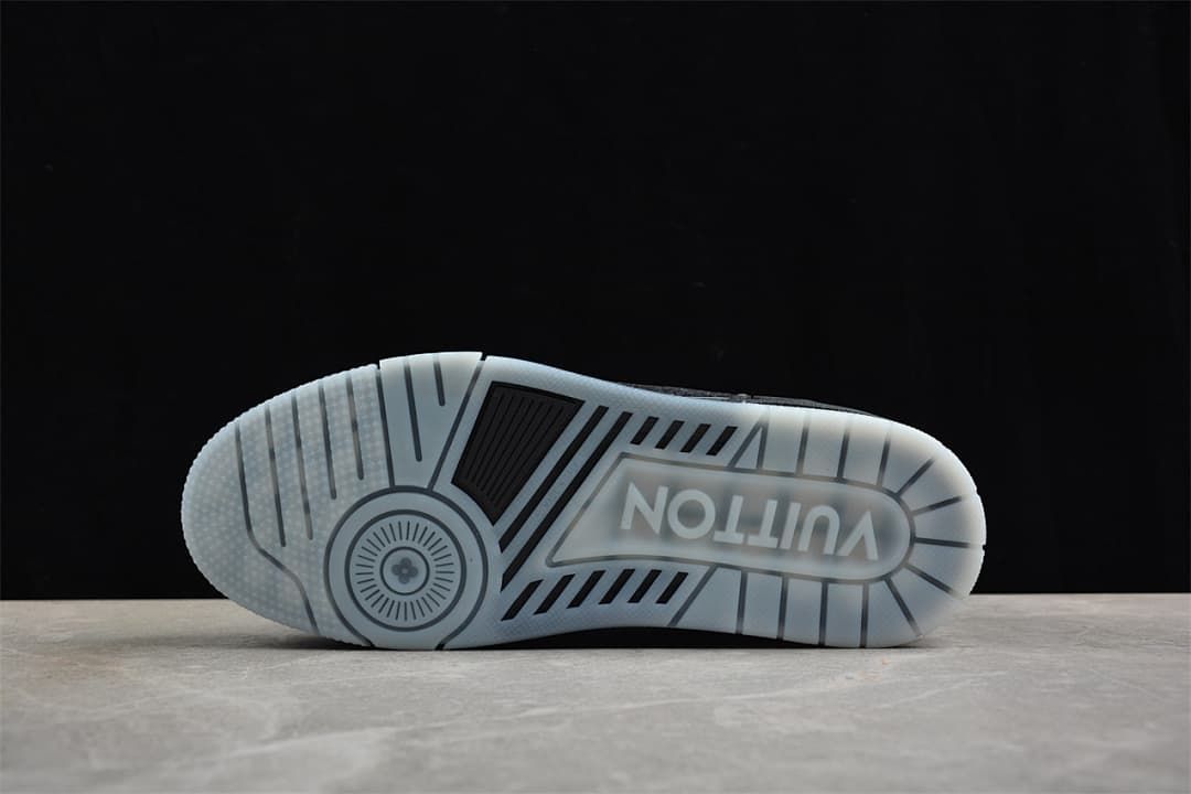 Bottom view of the translucent outsole with patterned tread.