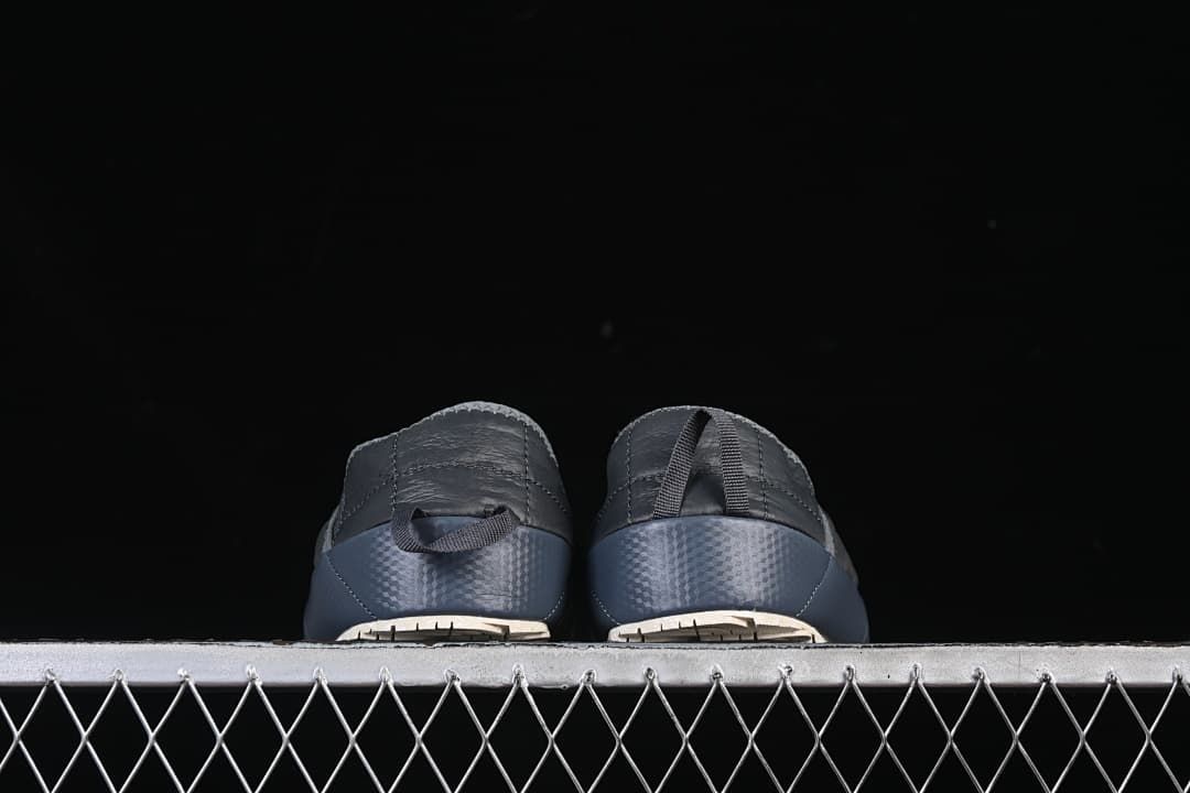 Rear view of both mules showing pull loops and blue heel panels