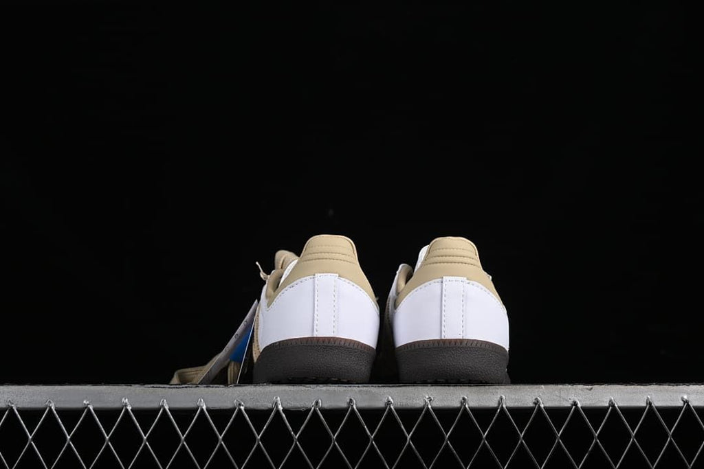Rear view of the pair showing beige heel tabs and dark outsoles