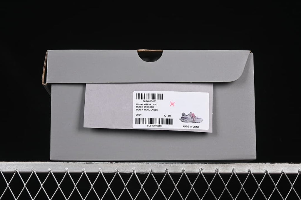 Grey shoe box label marked Track Sneaker, Grey, and C 39
