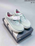 Pale mint adidas ZENBOOST low-top running shoes shown on a shoe box.