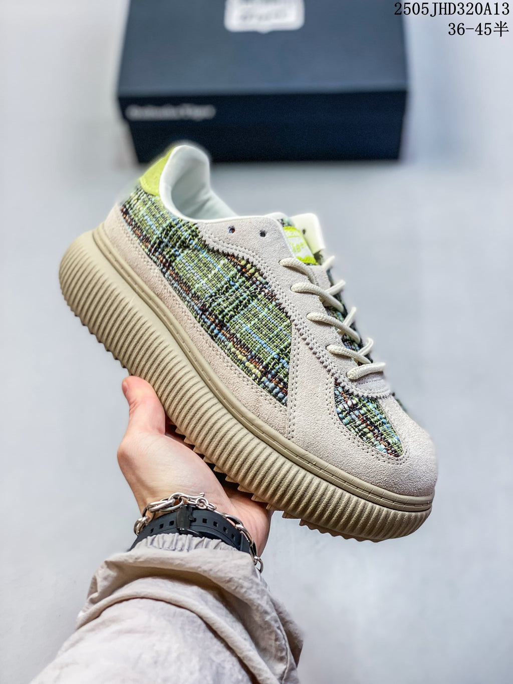 Angled side view of a neutral sneaker with a ribbed beige sole