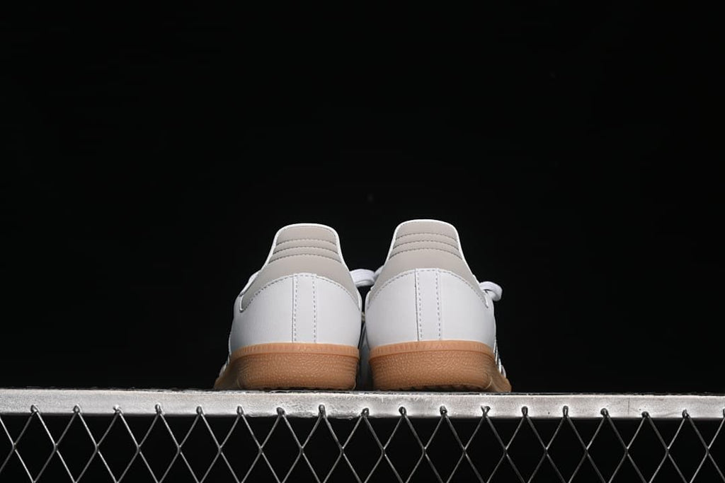 Rear view of the pair showing heel panels and gum soles
