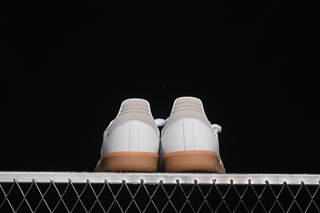 Rear view of the pair showing heel panels and gum soles