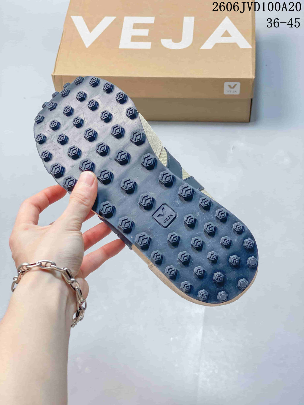 Close-up of the sneaker outsole with raised patterned tread