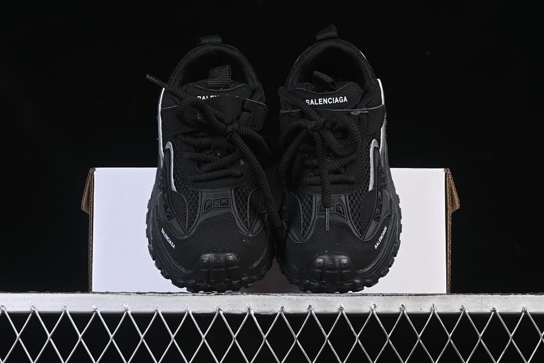 Front view of the pair showing the laces, toe panels, and branding.