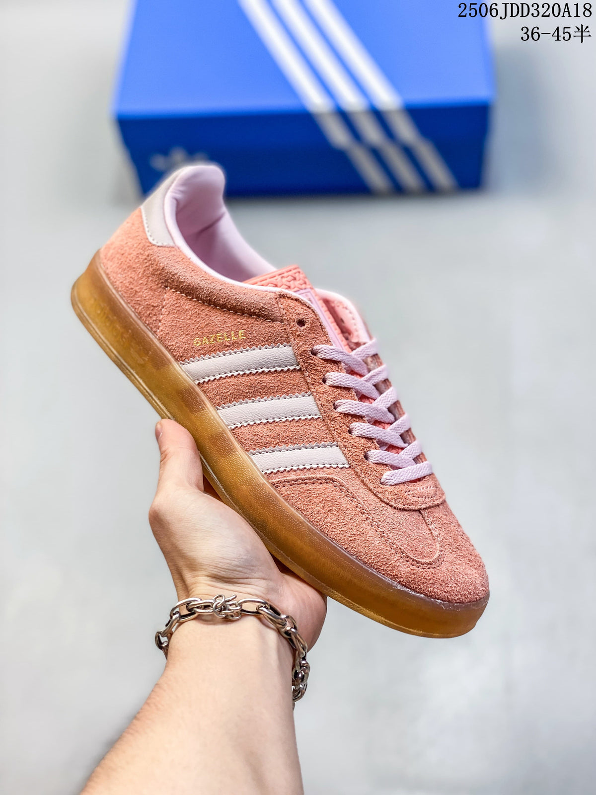 Coral Adidas Gazelle 90 sneaker with pale stripes and a gum-style sole