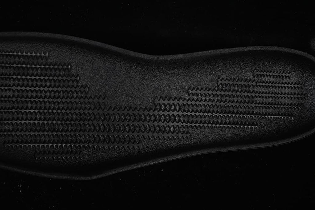 Close-up of the textured black outsole tread