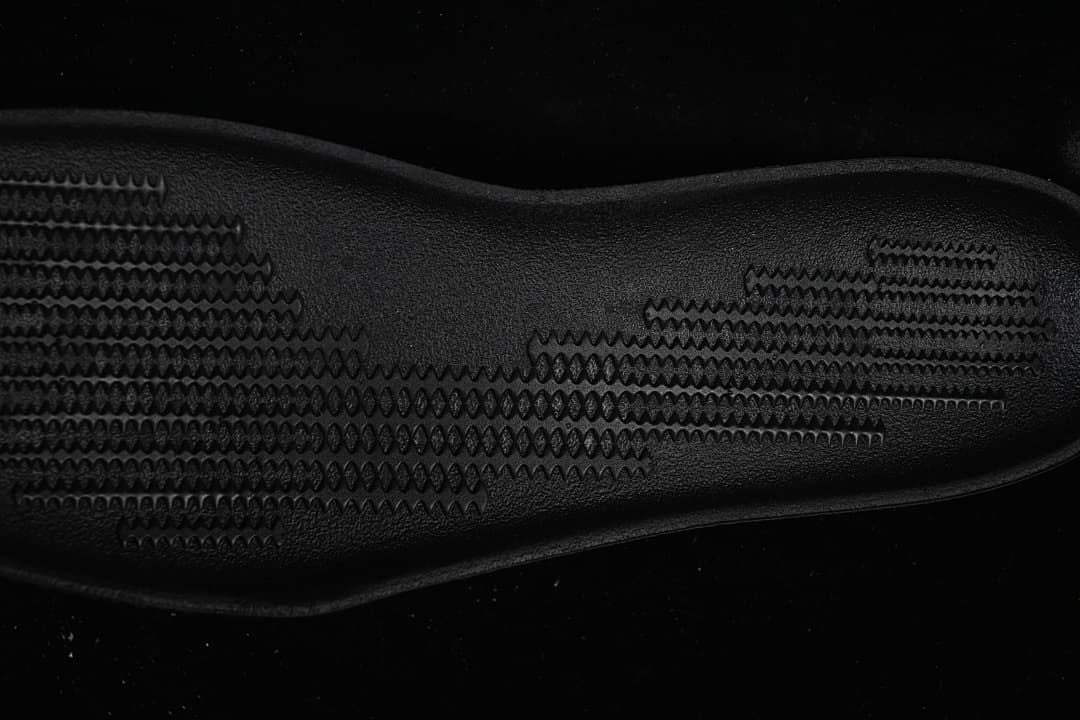 Close-up of the textured black outsole tread