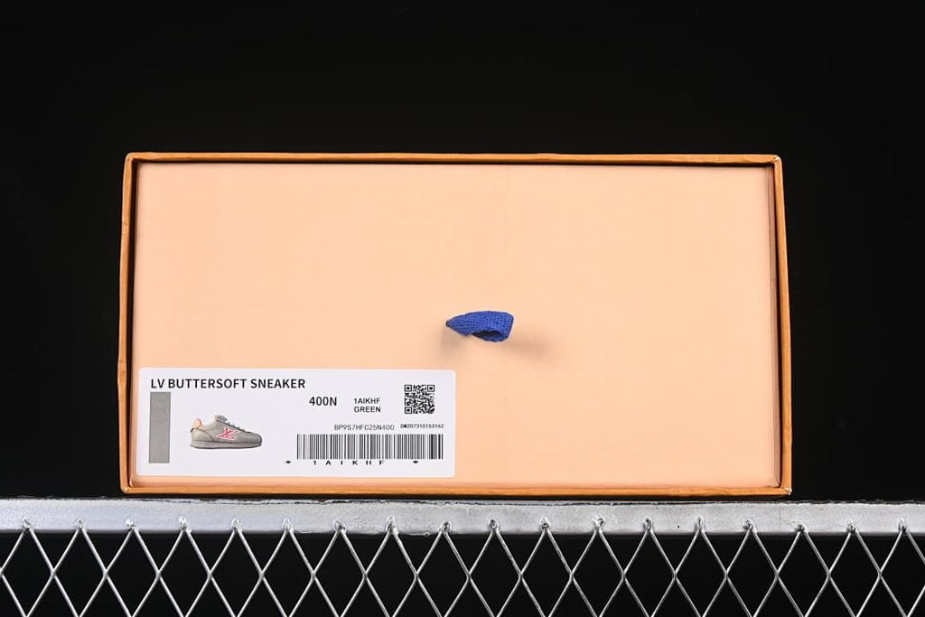 Shoebox label reading LV Buttersoft Sneaker and 1AIKHF Green