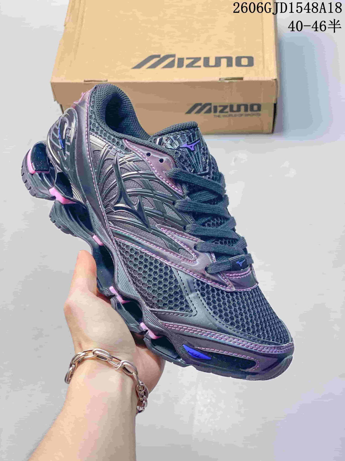 Dark gray Mizuno Prophecy 8 shoe with purple accents