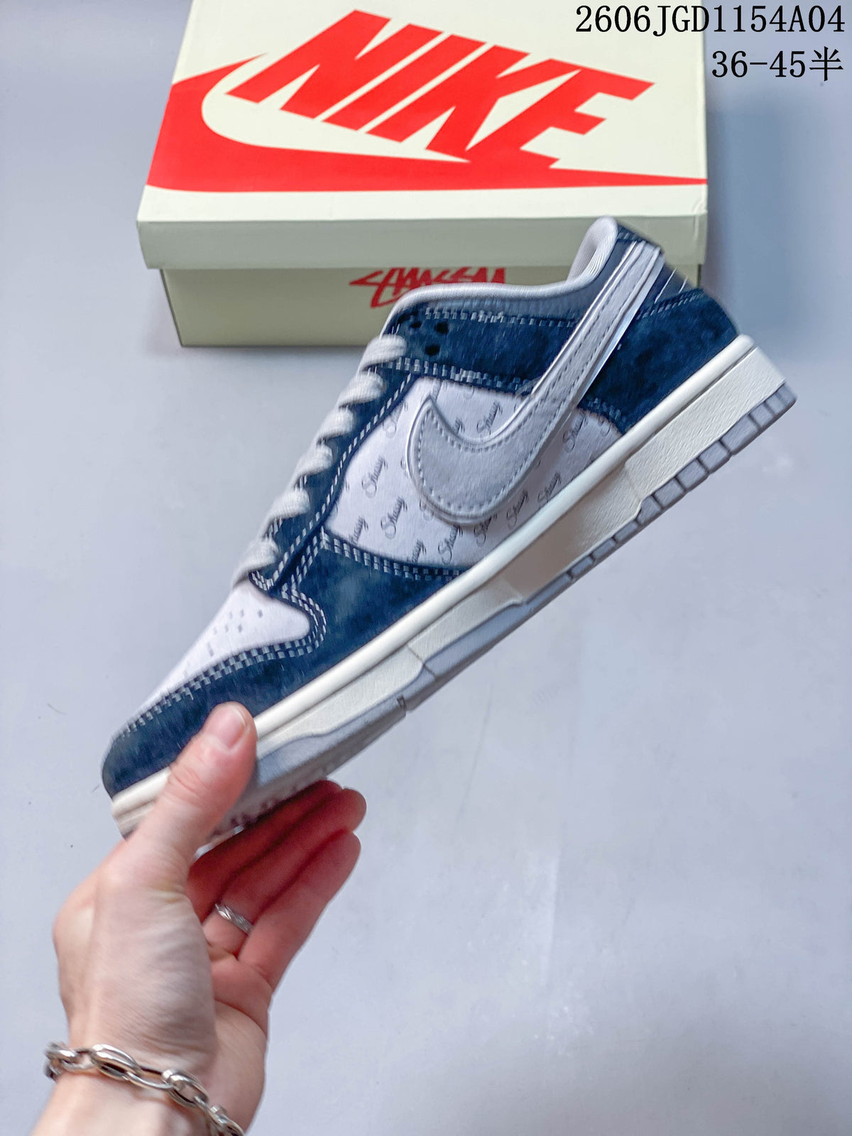 Side profile showing patterned panels and contrasting Swoosh