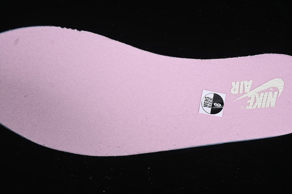 Pink insole with a visible US men's size 8 sticker
