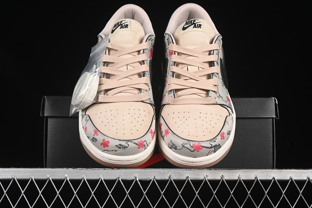 Front view of the pair showing the laces and patterned toe area
