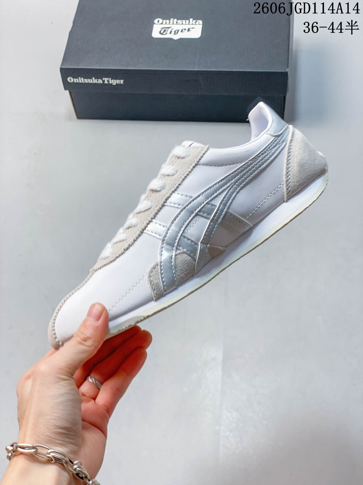 Side view of the white Runspark sneaker with silver stripes and gray overlays