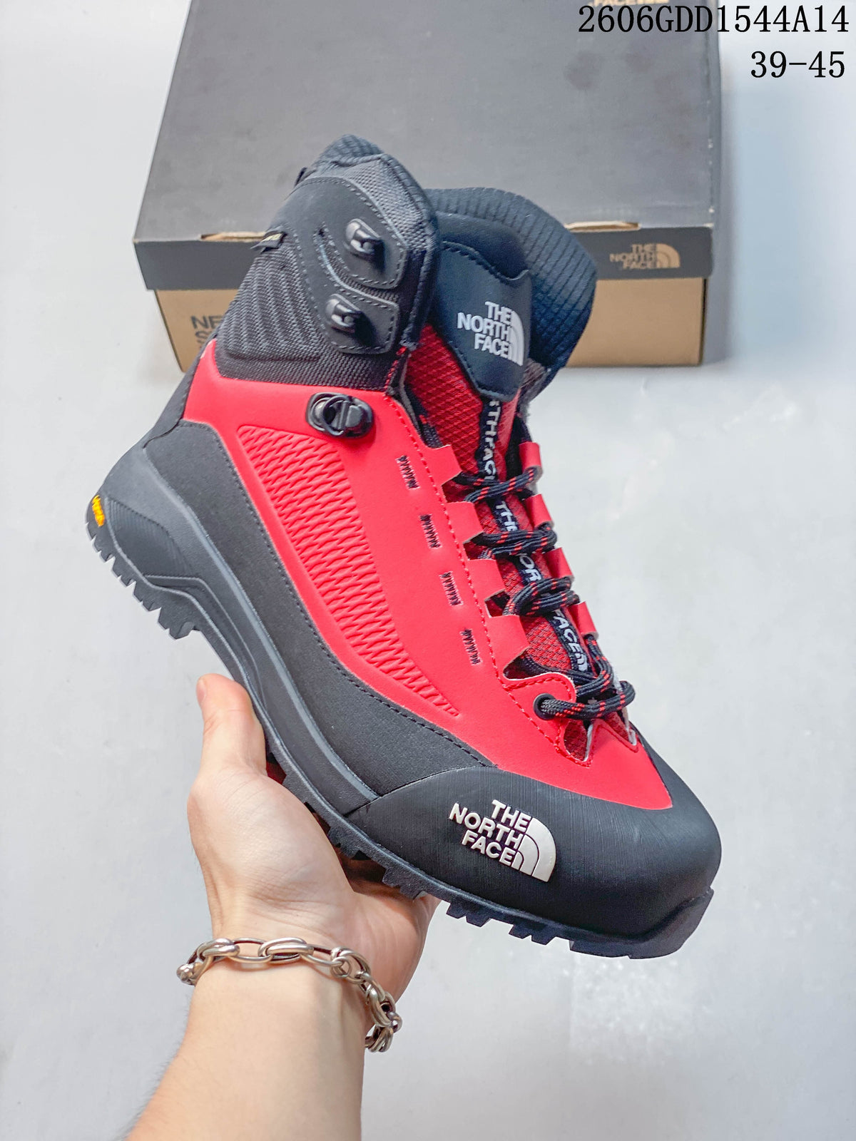 Side view of the red and dark gray Verto Alpine boot with a rugged outsole